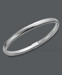 Layer it up for a fresh, new look! This unique bangle bracelet features a silver tone silicone setting with a 14k white gold joint clasp. Approximate diameter: 2-1/2 inches. Layer it up for a fresh, new look! This unique bangle bracelet features a silver tone silicone setting with a 14k white gold joint clasp. Approximate diameter: 2-1/2 inches.