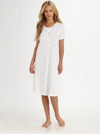 Luxurious versatility in a classic silhouette created from long-staple Egyptian Giza cotton, mercerized for ultra softness and a natural sheen.ScoopneckPartial button-front placketShort sleevesUnderstated, shaped styleMercerized Egyptian Giza cotton interlockMachine washImportedAdditional Information Women's Modern Size Guide Luxurious versatility in a classic silhouette created from long-staple Egyptian Giza cotton, mercerized for ultra softness and a natural sheen.ScoopneckPartial button-front placketShort sleevesUnderstated, shaped styleMercerized Egyptian Giza cotton interlockMachine washImportedAdditional Information Women's Modern Size Guide