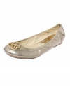 Initial impression: Round-toe ballet flats are often bedecked with a dainty bow, but the Fulton shoes by MICHAEL Michael Kors are marked with a metal logo emblem at the toe.