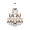 Glamour radiates from this dramatic Ralph Lauren chandelabra, featuring twenty four bulbs topped with petite silk shades and draped with dazzling crystals.