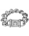 Kick boring style to the curb! Put the designer back into your style with this flashy bracelet by Michael Kors. Crafted in silver tone mixed metal, bracelet features a large curb link chain and a lock closure. Approximate length: 8 inches.