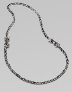 From the Jewels Verne Collection. A bold woven chain of sterling silver with a black rhodium finish has pretty filigree links with red garnet and goldplated accents.Red garnetBlack rhodium-plated sterling silver and rose goldplated sterling silverLength, about 26Imported