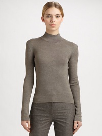 A melange cashmere/silk blend makes up this sleek, form-fitting piece.Mock neckLong sleeves50% cashmere/50% silkDry cleanMade in SwitzerlandModel shown is 5'11 (180cm) wearing US size 4. A melange cashmere/silk blend makes up this sleek, form-fitting piece.Mock neckLong sleeves50% cashmere/50% silkDry cleanMade in SwitzerlandModel shown is 5'11 (180cm) wearing US size 4.
