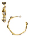 Glittering geometric stones put a rock and roll twist on traditional hoops. By Alexis Bittar.