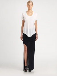 From the HELMUT capsule collection, this layered silhouette of luxe jersey boasts a curve-hugging fit and leg-baring front slit.Elastic waistbandPull-on styleAbout 46 long80% modal/20% nylonDry cleanImported of USA fabricModel shown is 5'10 (177cm) wearing US size Small. From the HELMUT capsule collection, this layered silhouette of luxe jersey boasts a curve-hugging fit and leg-baring front slit.Elastic waistbandPull-on styleAbout 46 long80% modal/20% nylonDry cleanImported of USA fabricModel shown is 5'10 (177cm) wearing US size Small.