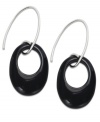 Elliptical elegance. Bold round onyx (22 ct. t.w.) in a contemporary silhouette stands out in this pair of sterling silver drop earrings to stunning effect. Approximate length: 2-3/4 inches. Approximate width: 3/4 inch.