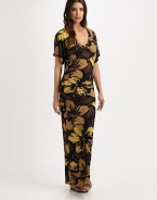 A gorgeous floral print with a curve-hugging maxi-dress fit creating a stunning and elongating coverup. V-neckShort sleevesPull-on style87% nylon/13% spandexHand washImported