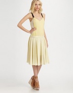 With dramatic contrast straps, this sporty silk dress makes a bold statement.Contrast spaghetti strapsWaistbandFull skirtAbout 22 from natural waistSilkDry cleanImportedModel shown is 5'9½ (176cm) wearing US size 4.