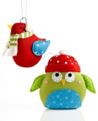 Crafted charm is the anything-but-common thread in two knit birds ready to perch in your tree. Patterns in their wings and tiny winter accessories ornament each with irresistible whimsy. Crafted charm is the anything-but-common thread in two knit birds ready to perch in your tree. Patterns in their wings and tiny winter accessories ornament each with irresistible whimsy.