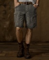 A slim-fitting rendition of its rugged counterparts, this denim cut-off updates the classic jean short with a faded wash and authentic cargo styling, giving it a hip modern look.