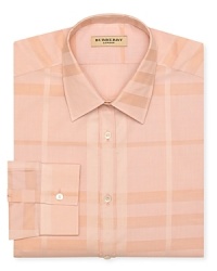 Patterned with a larger-than-life signature check design, this Burberry London dress shirt opens the day with iconic style. Patterned with a larger-than-life signature check design, this Burberry London dress shirt opens the day with iconic style.