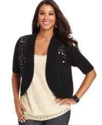 Add sparkle to your look with AGB's short sleeve plus size cardigan, featuring a sequined front! Add sparkle to your look with AGB's short sleeve plus size cardigan, featuring a sequined front!