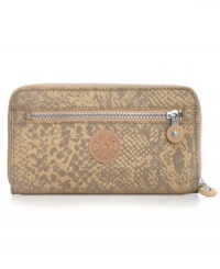 Get instantly organized with this slim Kipling wallet that discretely slips into your handbag and safely stores cash, coins, cards and ID, along with a few other extra essentials Get instantly organized with this slim Kipling wallet that discretely slips into your handbag and safely stores cash, coins, cards and ID, along with a few other extra essentials