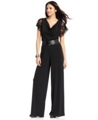 AGB's jumpsuit was made with parties in mind--the sheer lace sleeves and cowl neckline make a luxe statement! AGB's jumpsuit was made with parties in mind--the sheer lace sleeves and cowl neckline make a luxe statement!