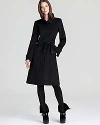 A luxe wool and cashmere fabric lends cozy appeal to the sleek Burberry London Baswick coat--clean lines and a tailored silhouette make for a sophisticated staple.