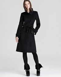 A luxe wool and cashmere fabric lends cozy appeal to the sleek Burberry London Baswick coat--clean lines and a tailored silhouette make for a sophisticated staple. A luxe wool and cashmere fabric lends cozy appeal to the sleek Burberry London Baswick coat--clean lines and a tailored silhouette make for a sophisticated staple.