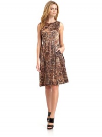 THE LOOKAllover leopard printPleated A-line skirtBack zip with hook-and-eye closureVented back hemTHE FITAbout 38 from shoulder to hemTHE MATERIALCotton/polyacrylic/polyesterFully linedCARE & ORIGINDry cleanImportedModel shown is 5'9½ (176cm) wearing US size 4. 