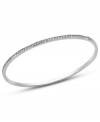 Stack up these Swarovski bangles for maximum sparkle! This thin bracelet boasts clear crystals at the edges. Crafted in stainless steel. Approximate diameter: 2-1/2 inches.