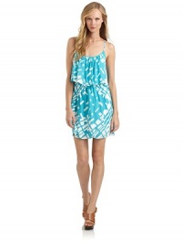 THE LOOKGeometric printScoop necklineRuffle overlay at bodiceAdjustable Y-back strapsElastic waistTHE FITAbout 32 from shoulder to hemTHE MATERIALRayonCARE & ORIGINDry cleanMade in USAModel shown is 5'8 (172½cm) wearing US size Small. 