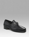 Classic leather moccasin loafer with silvertone horse bit hardware. Leather sole Made in Italy