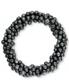 Shades of gray. This clustered bracelet from Charter Club adds allure with smoky glass beads. Stretches to fit wrist. Crafted in hematite tone mixed metal. Approximate diameter: 2-1/2 inches. Approximate length (when stretched): 7 inches.