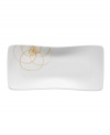 A modern canvas for everyday meals, the Bloom Sun rectangular plates have a smooth, flat surface that's artfully scribbled with golden florals for a look that's fresh--and in durable porcelain--not fussy. From Villeroy & Boch.