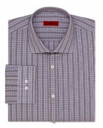 A regular fit HUGO dress shirt touts traditional barrel cuffs and timeless plaid for effortless office polish.