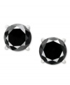 Elegance in ebony. Black diamonds (3/4 ct. t.w.) set in 14k white gold give this pair of earrings a sophisticated touch. Approximate diameter: 3/4 inch.