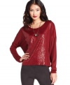 Sequins add high-shine to this Kensie top for a glam look, day or night!