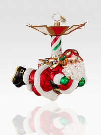 Crafted from individually hand-painted, glitter-dusted glass, Santa found a new means of transportation and it's certainly innovative! Hand-blownHand-painted5½ tallMade in Poland Crafted from individually hand-painted, glitter-dusted glass, Santa found a new means of transportation and it's certainly innovative! Hand-blownHand-painted5½ tallMade in Poland