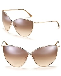 New from Tom Ford! Sleek criss-cross sunglasses in a modern cat eye silhouette. New from Tom Ford! Sleek criss-cross sunglasses in a modern cat eye silhouette.