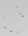 From the Wonderland Collection. A long, elegant sterling silver chain is sprinkled with touches of clear quartz, mother-of-pearl and onyx.Clear quartz, mother-of-pearl, onyx Sterling silver Length, 40 Lobster clasp Imported