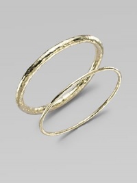 A simple, sophisticated, slender bangle of 18k yellow gold with a rich hammered texture. 18k yellow gold Diameter, about 2½ Imported Please note: Bracelets sold separately.