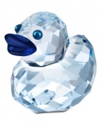 Swarovksi's blue-billed Cheerful Zoe duck stands out in faceted lavender crystal with metallic eyes that bring new light to the Happy Ducks flock of figurines.