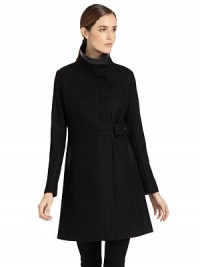 THE LOOKFlap collar with faux leather trimSnap-frontBelted waistDual seam pocketsTHE FITAbout 32 from shoulder to hemTHE MATERIALShell: wool/polyester/viscoseTrim: polyurethane/viscoseFully linedCARE & ORIGINDry cleanImportedModel shown is 5'10 (177cm) wearing US size 4. THE LOOKFlap collar with faux leather trimSnap-frontBelted waistDual seam pocketsTHE FITAbout 32 from shoulder to hemTHE MATERIALShell: wool/polyester/viscoseTrim: polyurethane/viscoseFully linedCARE & ORIGINDry cleanImportedModel shown is 5'10 (177cm) wearing US size 4.