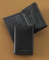 Slim down your accessories with the sleek, trim design of this go-everywhere leather wallet from Geoffrey Beene.