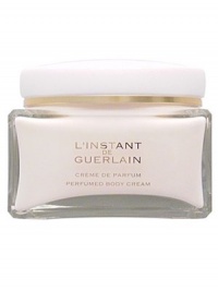 L'Instant de Guerlain Perfumed Body Creme. Unexpected, enchanting and fresh, a fragrance inspired by unforgettable moments in a rich body creme. Indulge yourself and enjoy the luminous, sparkling, sensual essence of citrus honey blended with magnolia and warm, sexy amber. 7 oz. 