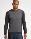 A unique design with unparalleled style, defines this two-toned jacquard sweater knitted from superior virgin wool.CrewneckRibbed knit collar, cuffs and hemVirgin woolHand washImported