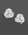 Round-cut diamonds (1/5 ct. t.w.) make a classic style sparkle. Earrings set in 14k white gold.