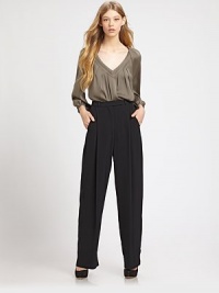 A deeper rise and tapered leg lend a sophisticated shape to this stunning silhouette tailored with crisp front pleats.High waistBelt loopsZip-flyAngled pocketsPleated legsBack welt pocketsRise, about 14Inseam, about 32TriacetateDry cleanImportedModel shown is 5'10 (177cm) wearing US size 4.OUR FIT MODEL RECOMMENDS ordering true size. A deeper rise and tapered leg lend a sophisticated shape to this stunning silhouette tailored with crisp front pleats.High waistBelt loopsZip-flyAngled pocketsPleated legsBack welt pocketsRise, about 14Inseam, about 32TriacetateDry cleanImportedModel shown is 5'10 (177cm) wearing US size 4.OUR FIT MODEL RECOMMENDS ordering true size.
