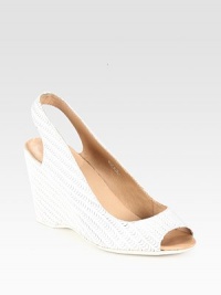 Woven slingback design in soft Italian leather with a substantial wedge and peep toe. Self-covered wedge, 3½ (90mm)Leather upperLeather liningRubber solePadded insoleImportedOUR FIT MODEL RECOMMENDS ordering one half size up as this style runs small. Woven slingback design in soft Italian leather with a substantial wedge and peep toe. Self-covered wedge, 3½ (90mm)Leather upperLeather liningRubber solePadded insoleImportedOUR FIT MODEL RECOMMENDS ordering one half size up as this style runs small.