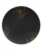 A modern canvas for everyday meals, Bloom Shadow dinner plates have smooth, flat surfaces that are artfully scribbled with sun-yellow florals for a look that's fresh--and in durable porcelain--not fussy. From Villeroy & Boch.