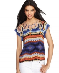 MM Couture puts a new spin on this season's tribal-print trend with this chic top! Openwork cutouts along the neckline add extra sizzle. MM Couture puts a new spin on this season's tribal-print trend with this chic top! Openwork cutouts along the neckline add extra sizzle.