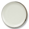 A hand-painted crescent of stunning platinum rims the edges of this thoroughly modern dinnerware collection.