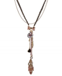 Fashion that really flies. This Y-shaped necklace from Betsey Johnson is a real charmer with a dangling feather pendant with crystal accents. Also includes an intertwined black cord, gold tone bow with fuchsia-colored accents, fuchsia crystal cup chain, gold tone flower, small crystal teardrop and gold tone bubble heart. Crafted in antiqued gold tone mixed metal. Approximate length: 16 inches + 3-inch extender. Approximate drop: 5-1/4 inches. Fashion that really flies. This Y-shaped necklace from Betsey Johnson is a real charmer with a dangling feather pendant with crystal accents. Also includes an intertwined black cord, gold tone bow with fuchsia-colored accents, fuchsia crystal cup chain, gold tone flower, small crystal teardrop and gold tone bubble heart. Crafted in antiqued gold tone mixed metal. Approximate length: 16 inches + 3-inch extender. Approximate drop: 5-1/4 inches.
