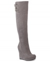 Take on the day in this smooth and sexy style. G by GUESS' Saill wedge boots feature a smooth suede upper and a duo of buckled accents at the top of the shaft.