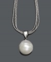 A daytime accessory or an evening statement piece. Fresh by Honora necklace features three textured sterling silver chains that stand in stark contrast to a lustrous cultured freshwater pearl (12-13 mm) pendant. Approximate length: 18 inches. Approximate drop: 3/4 inch.