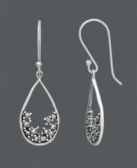 Like sand collecting in an hourglass, these earrings are timeless. Genevieve & Grace design features scattered marcasite settled at the bottom of a smooth, sterling silver teardrop. Approximate drop: 1-1/2 inches. Like sand collecting in an hourglass, these earrings are timeless. Genevieve & Grace design features scattered marcasite settled at the bottom of a smooth, sterling silver teardrop. Approximate drop: 1-1/2 inches.