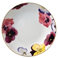 Pensees soup bowl by Bernardaud. This lively, luxurious collection is sure to transform your table into a celebration of spring. The floral watercolor pattern features delicate, multicolored pansies that appear to be strewn across the surface of each piece.