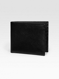 Saffiano leather wallet opens to eight credit card slots and two billfold compartments. Embossed Prada logo detail 4¼W X 3¾H Made in Italy 